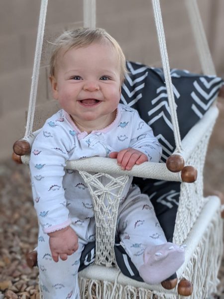 Mattie loves to swing!